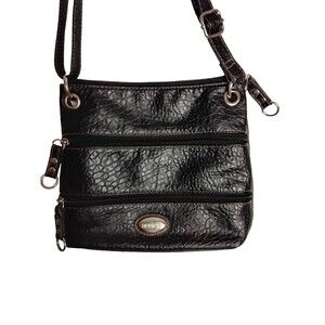 Womans Rosetti black pebble faux leather medium pouch handbag with front pockets